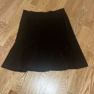 Lovely panelled skirt with back zip closure and tulip skirt detail.